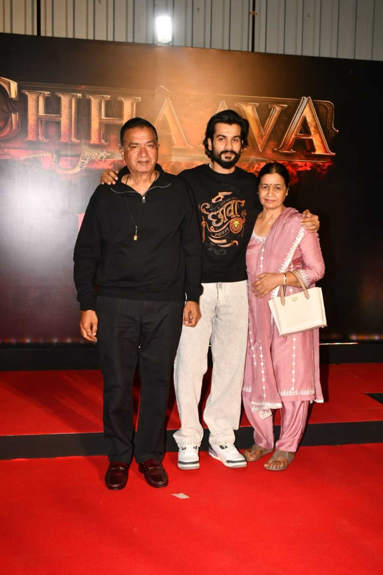 Actor Sunny Kaushal poses with his and Vicky's parents at the screening