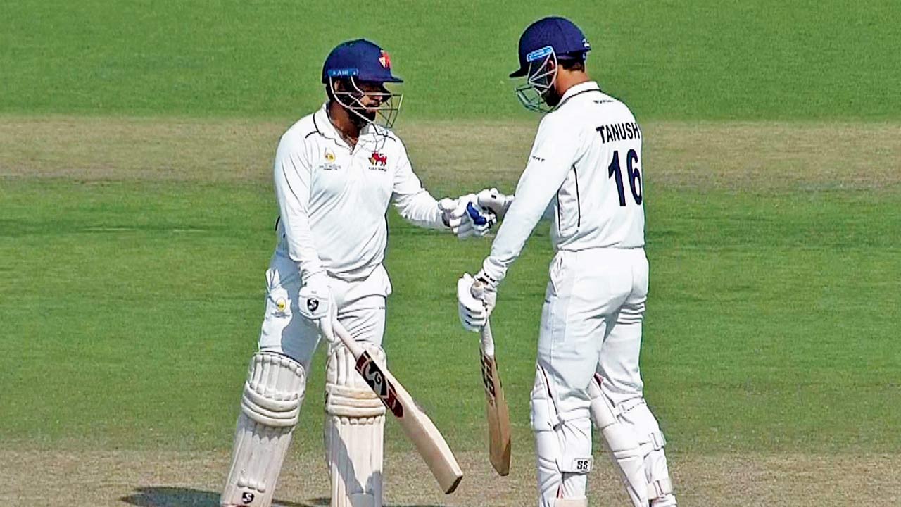 Mumbai’s Tanush Kotian (right) and Shams Mulani during their  165-run stand. Pic/BCCI