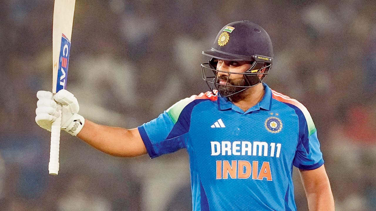 India skipper Rohit Sharma celebrates his century against England in Cuttack on Sunday. Pic/PTI