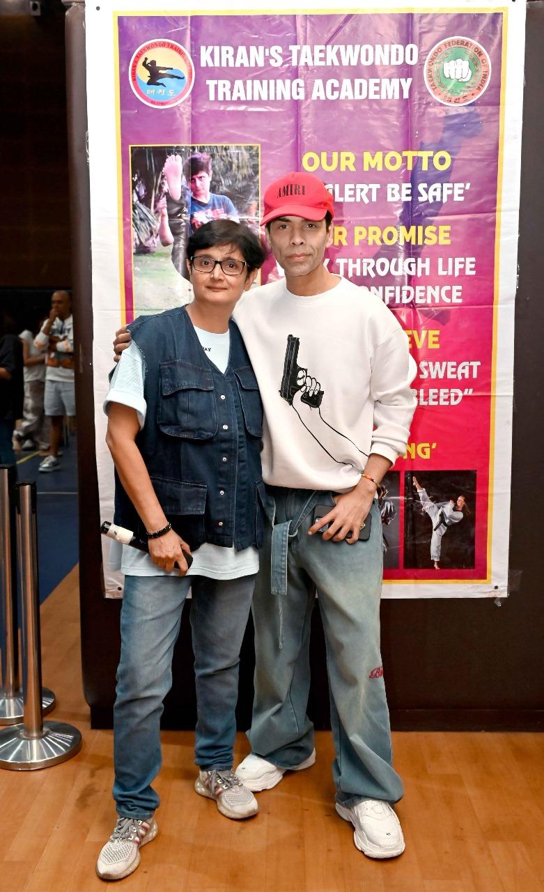 Karan Johar looked dashing in a white sweatshirt and comfy blue jeans