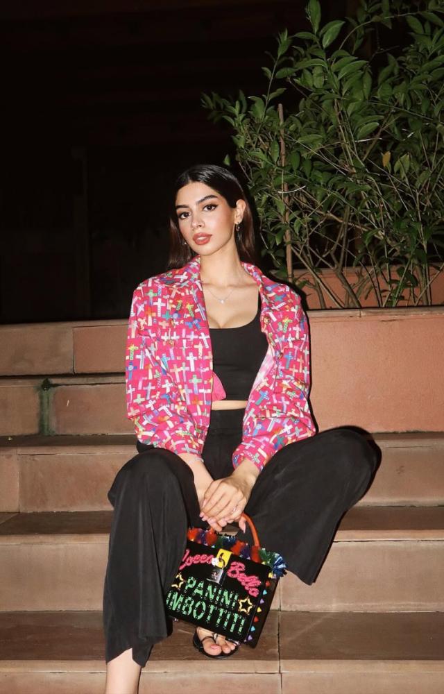 Khushi elevated a simple all-black look with a colourful printed jacket and it is perfect for a date night