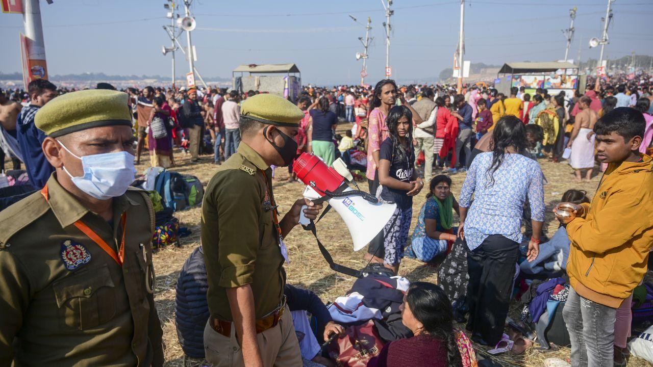 This year, over 10 lakh devotees have undertaken Kalpavas at the Triveni Sangam, as per the UP government.
(In Pic: Police personnel make announcements as devotees gather to take holy dip at Sangam)