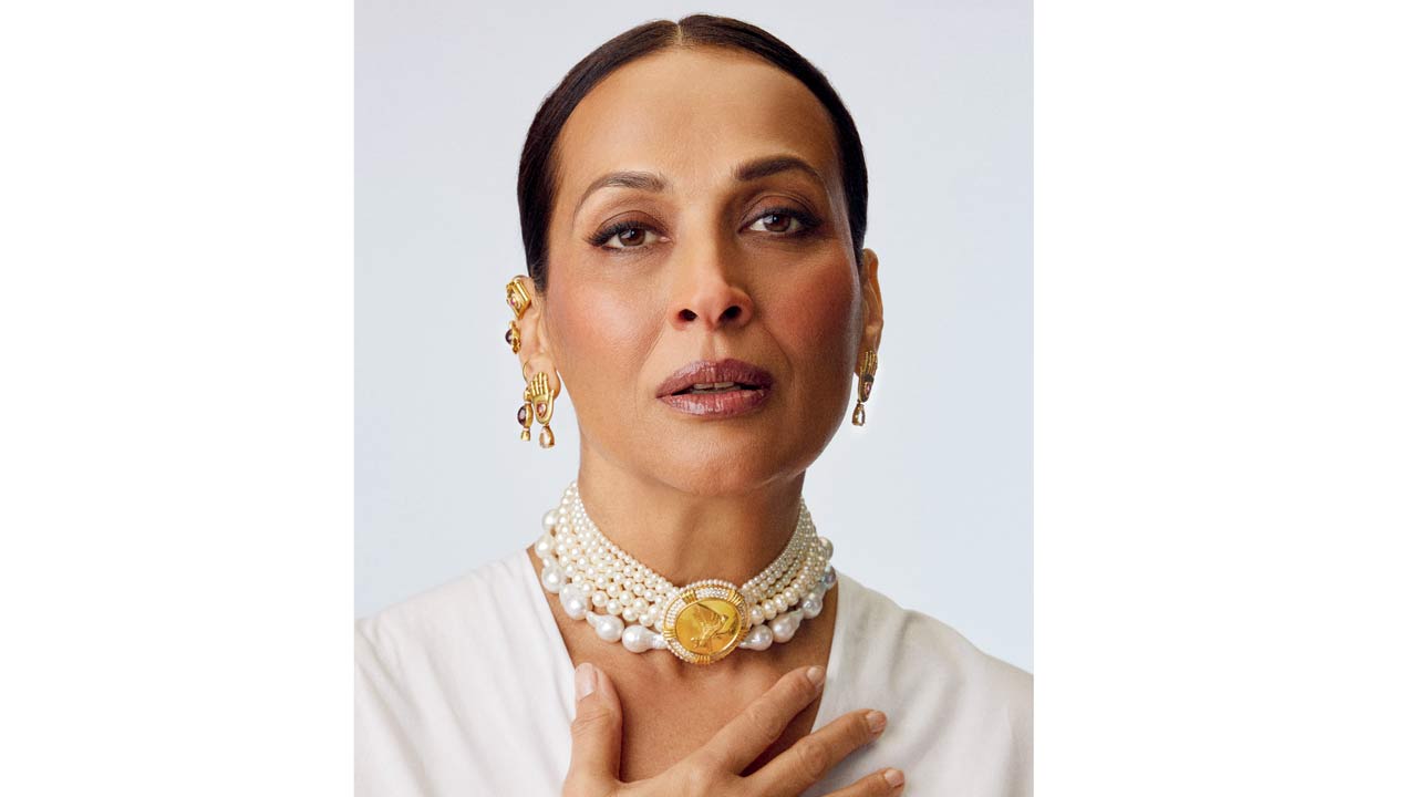 Former supermodel Madhu Sapre wears the Maharani Maker neckpiece, stacked earrings, and cuffs inspired by the House of Masaba mascots