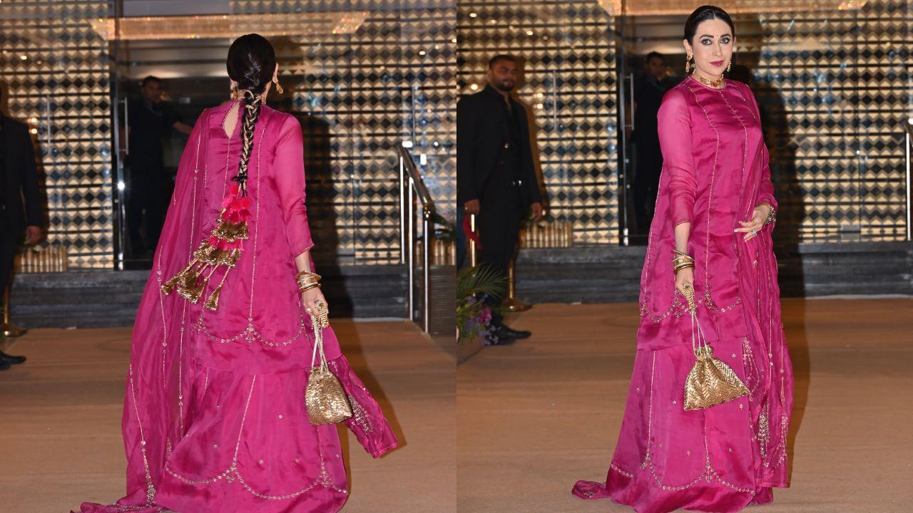 Karisma, staying true to her chic aesthetic, wore a rich dark pink suit, adding a vibrant contrast to the celebration