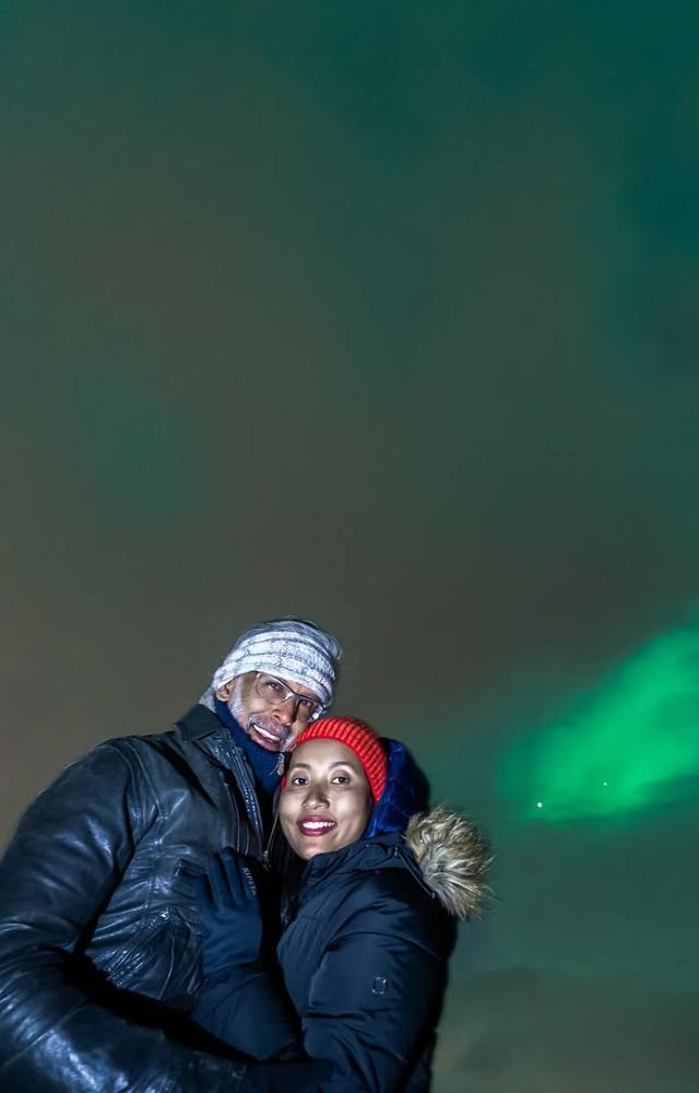 Milind Soman shared a sneak peek from the trip. In one of the pictures shared on Instagram, the couple was seen posing against the Northern lights or aurora.

