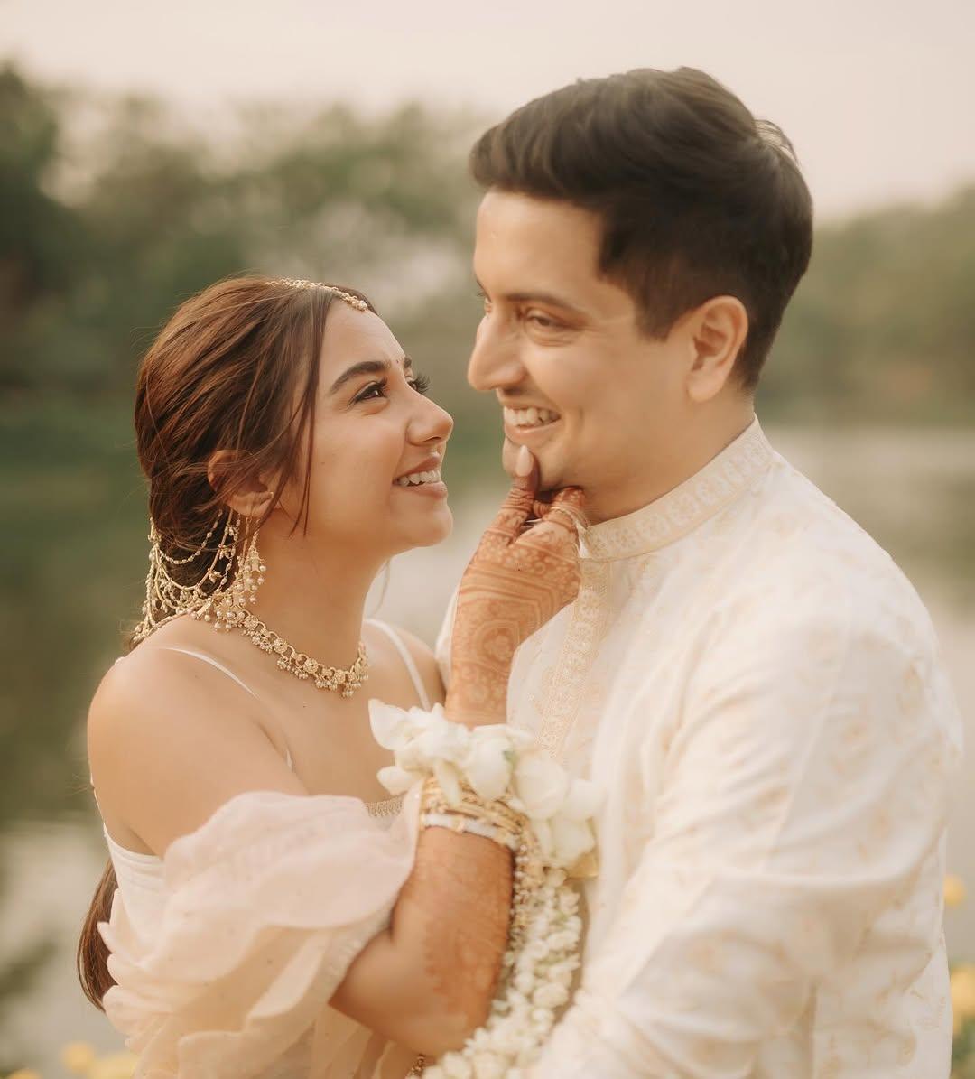 Prajakta wore an ivory kurta and crushed sharara set with an organza dupatta, while Vrishank opted for a printed kurta in a similar shade.