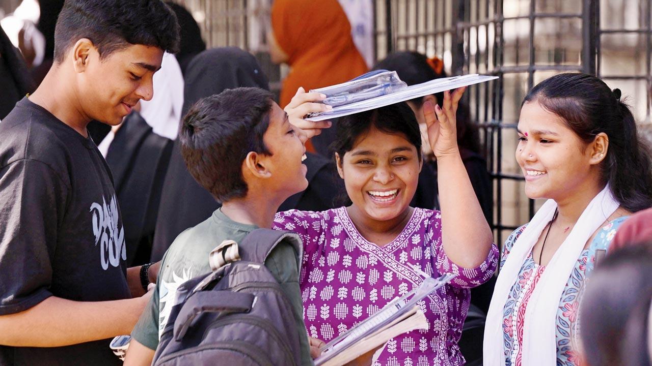 Students having a light moment before entering Saraswati Mandir High School exam centre in Mahim for the SSC board exam. Pic/Ashish Raje