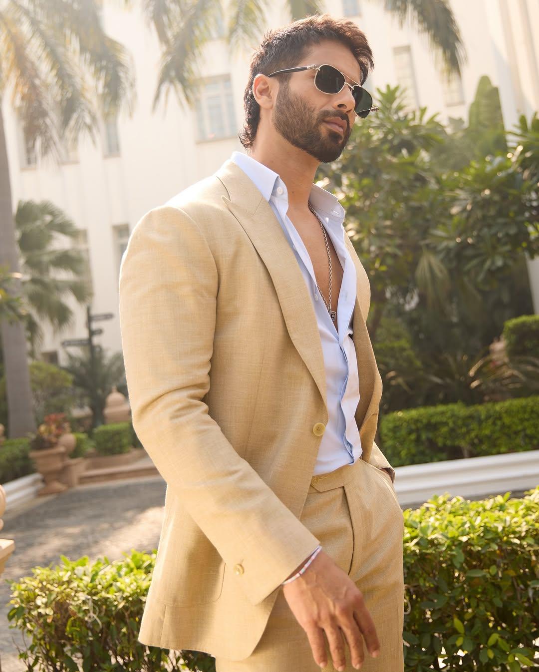 Office Meeting -
Do you have an office meeting to attend and wish to get a perfect three-piece suit to ace your look? Then worry not—Shahid Kapoor's beige suit set paired with a light blue shirt is the apt outfit for your office meeting.