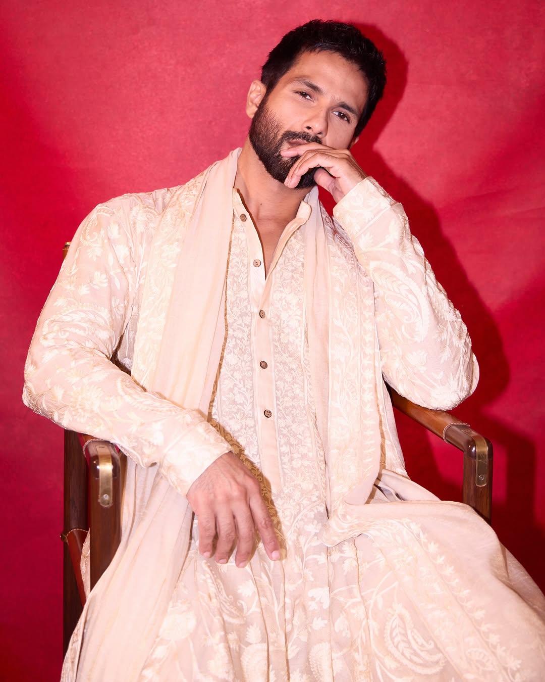 Wedding -
What is this behaviour? It’s your wedding, and you are still roaming around in your T-shirts? Quickly head out and get something like this! In this look, Shahid can be seen stealing the spotlight in a printed beige sherwani and dupatta.