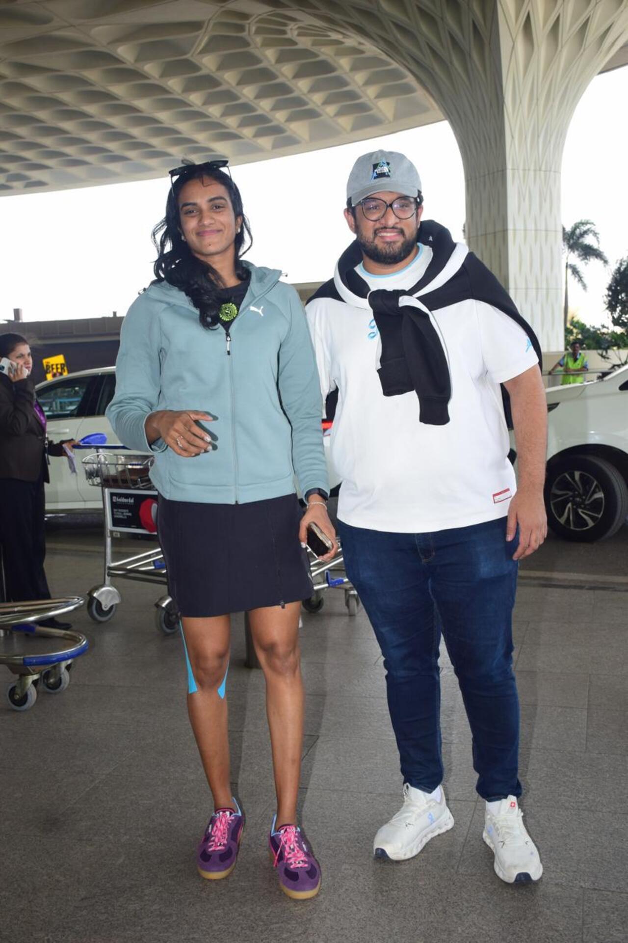 Ace badminton player PV Sindhu was spotted with her husband Venkata Datta Sai at the Mumbai airport.