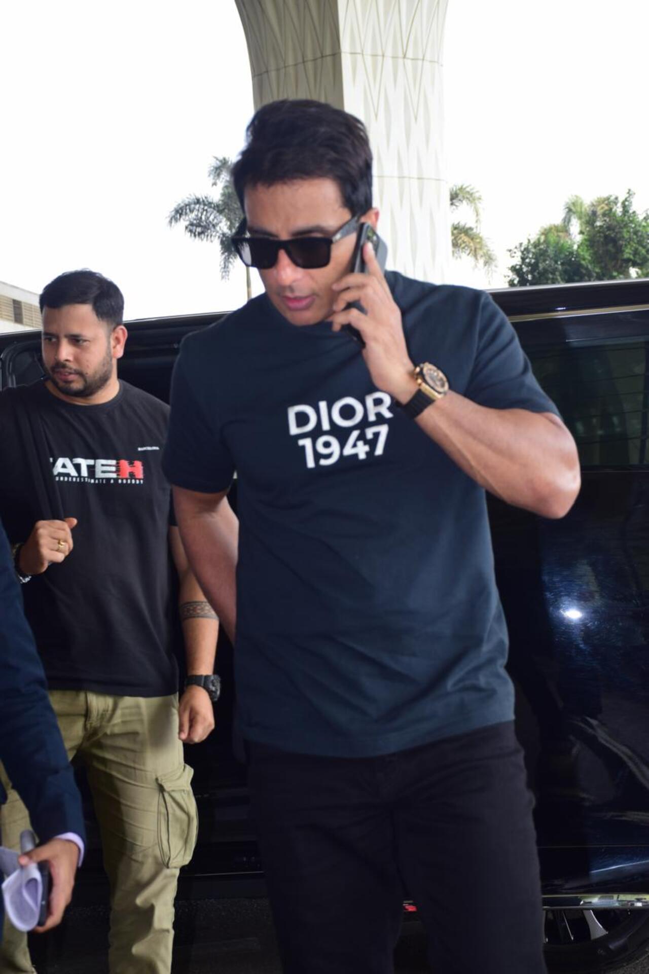Actor Sonu Sood was spotted at the airport. He was busy on a call.