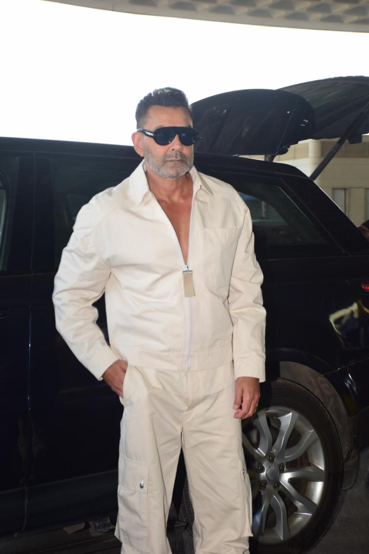 Bobby Deol looked stylish in his white ensemble at the airport.