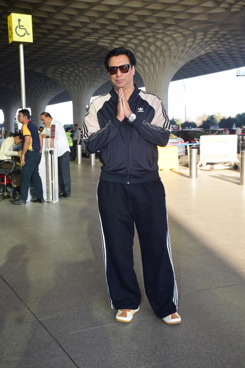 Madhur Bhandarkar was clicked at Mumbai airport as he jetted off from the city