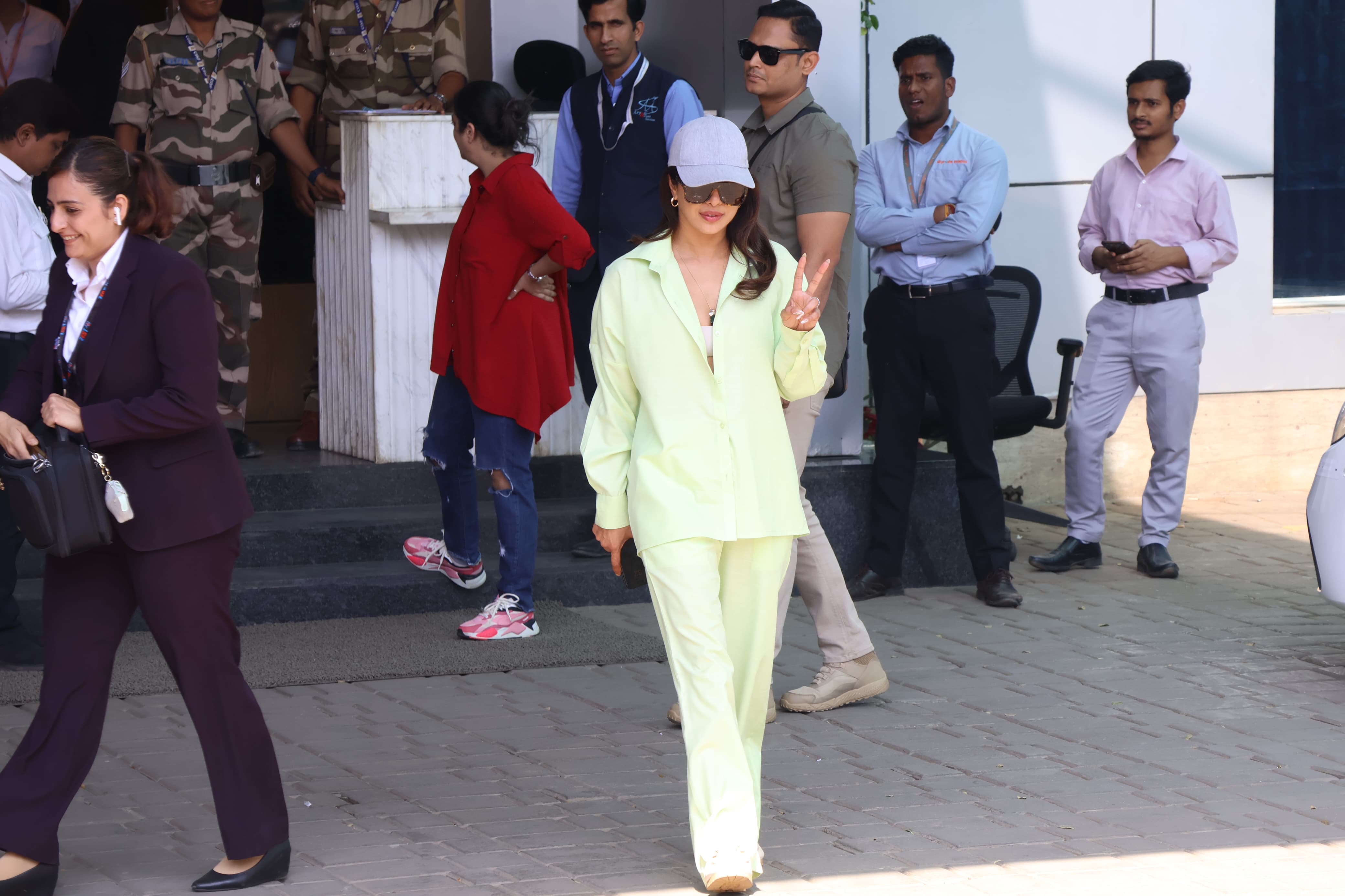 Priyanka wore a stunning light green co-ord set as she waved at the paparazzi at Mumbai airport