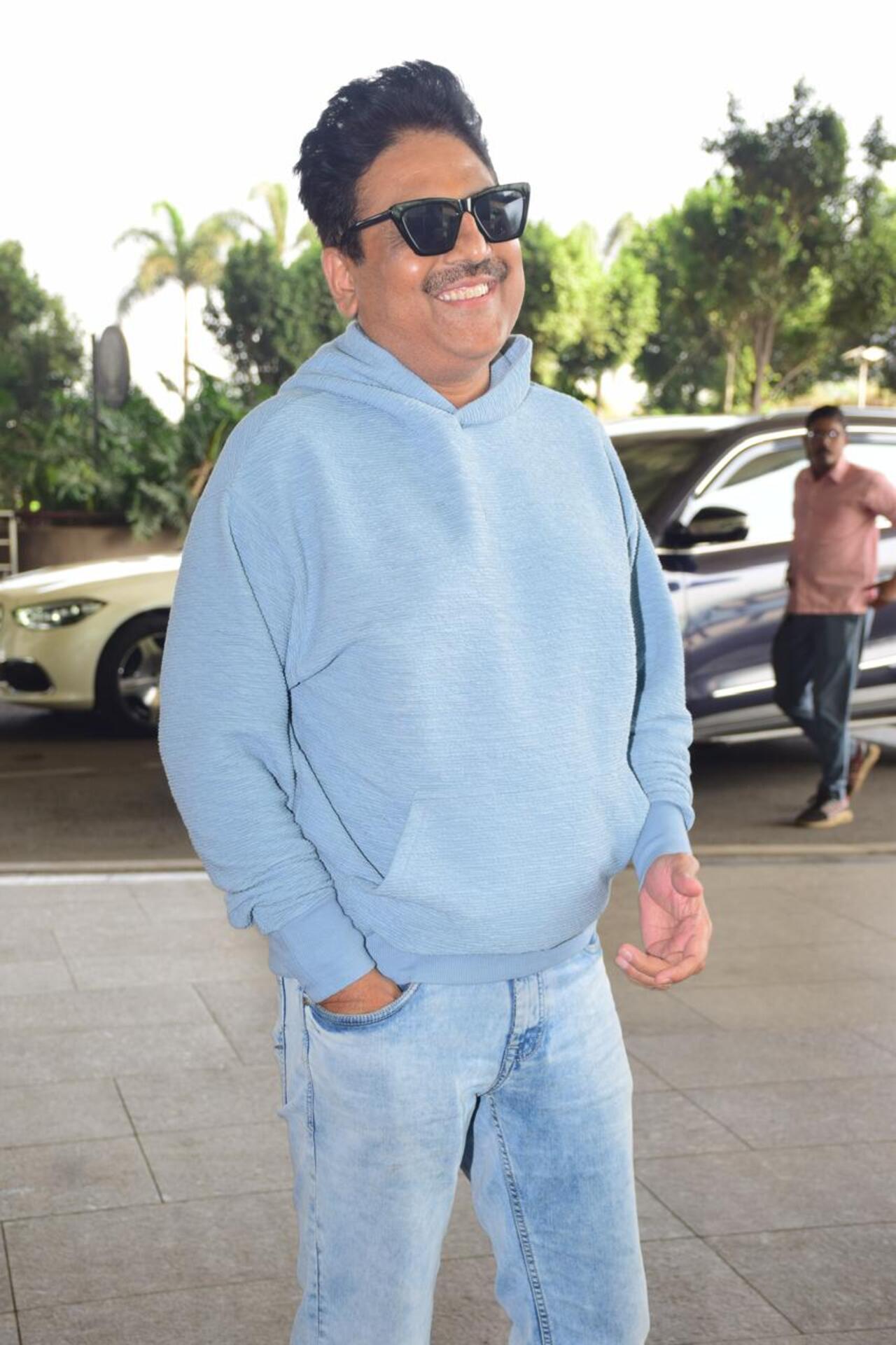 Actor and poet Shailesh Lodha was all smiles as he was photographed at the airport.
