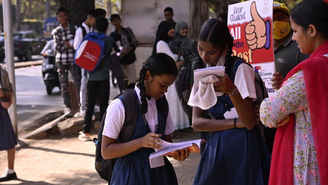 Students doing their final revision before they enter the examination hall at Saraswati Mandir High School in Mahim on Friday. (PIC/Ashish Raje)