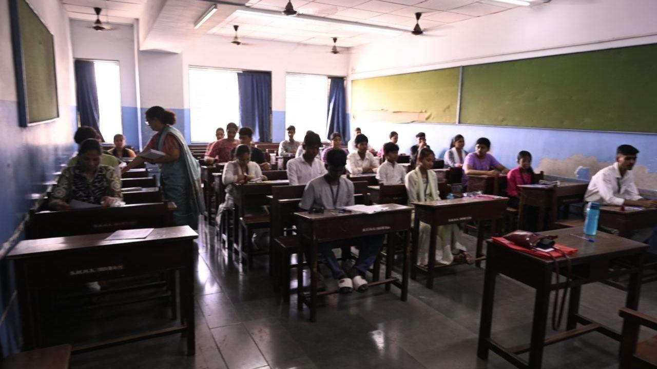Supervisors distributing SSC board exam papers at Saraswati Mandir High School in Mahim on Friday. (PIC/Ashish Raje)