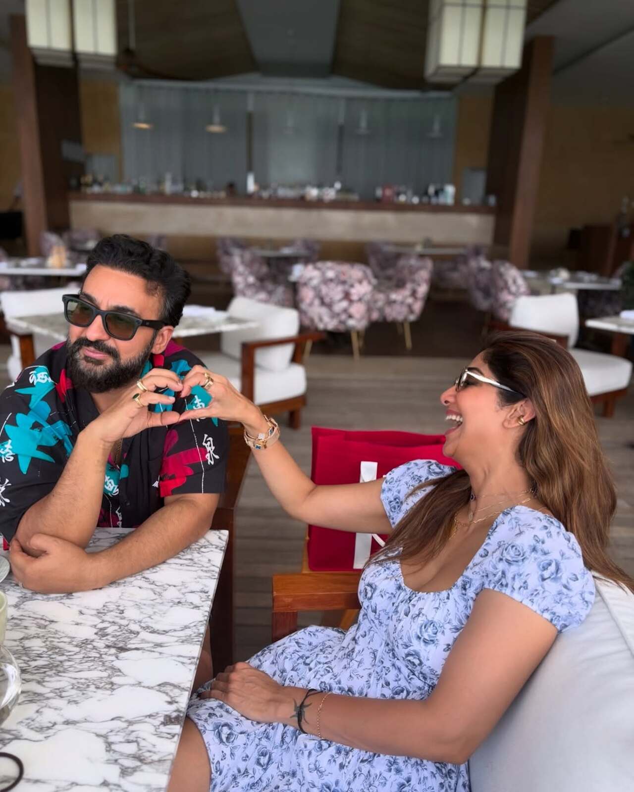 Shilpa Shetty shared an adorable picture with husband Raj Kundra where they can be seen trying to make a heart using their hand