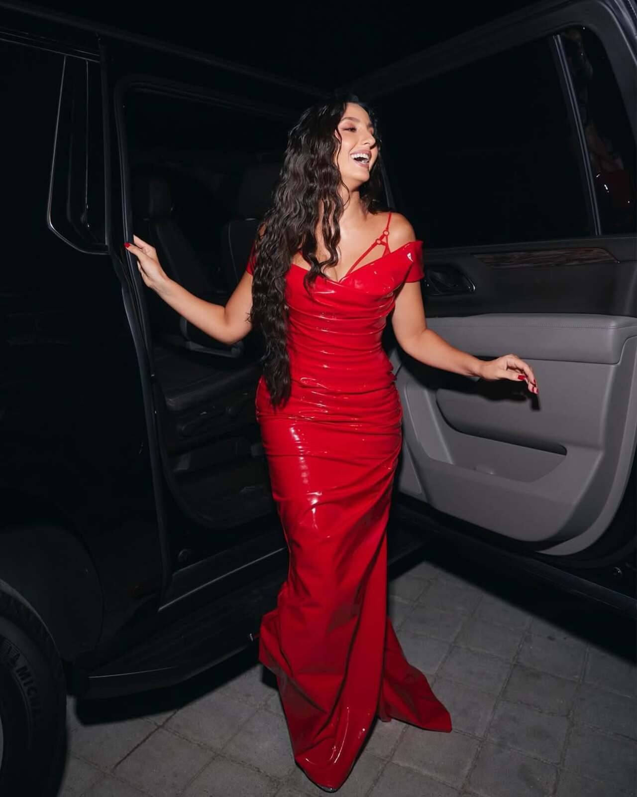 Nora Fatehi has always been extra with her looks. Here's one for a sexy date night with your significant other.