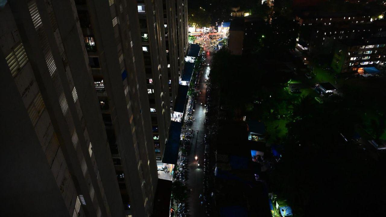 There are no streetlights on this stretch of densely packed street, which is roughly 700m in length