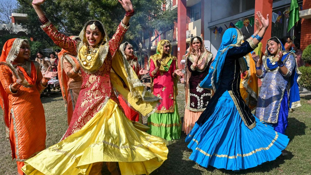 Students perform Punjabi folk dance 'Giddha' as they celebrate Lohri in Amritsar (Pic: AFP)
