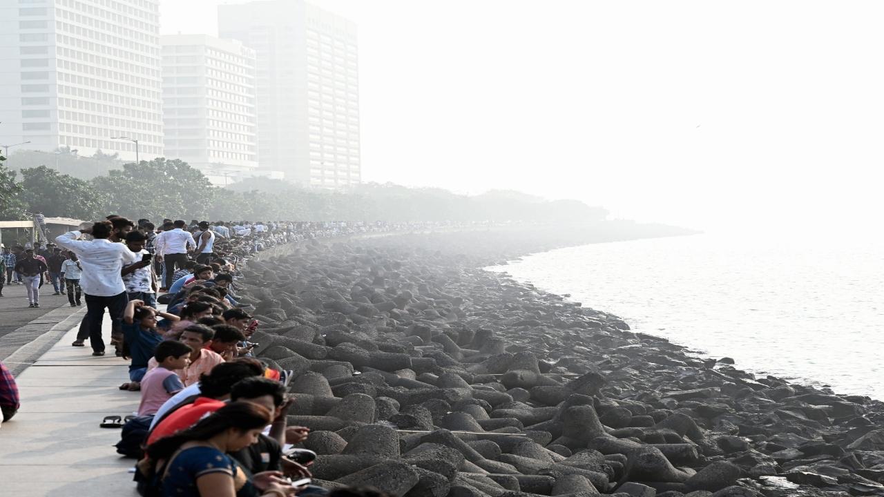 Families, friends, and couples were spotted clicking selfies and strolling along the sea-facing stretch