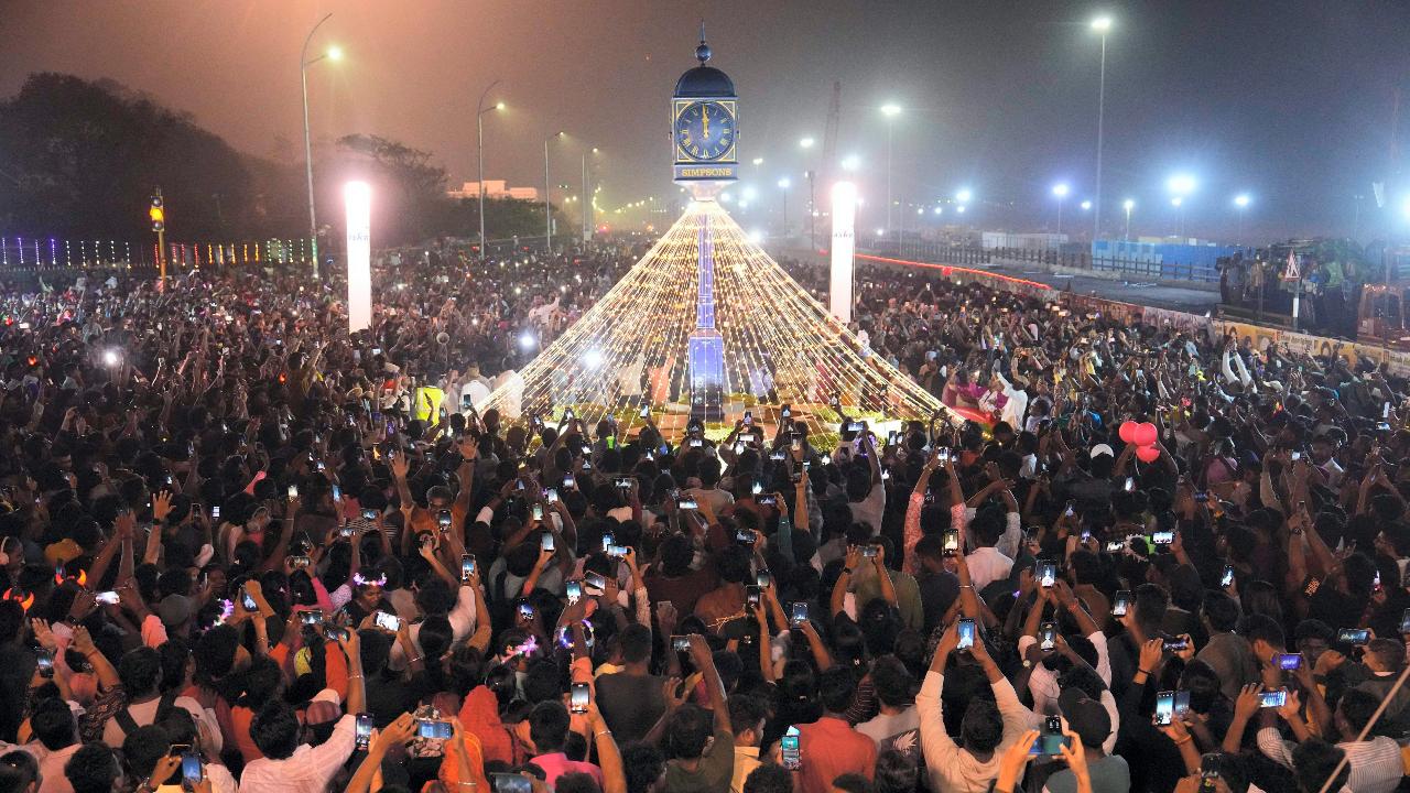 People take part in celebrations on the eve of New Year 2025, at Marina Beach in Chennai (Pic: PTI)