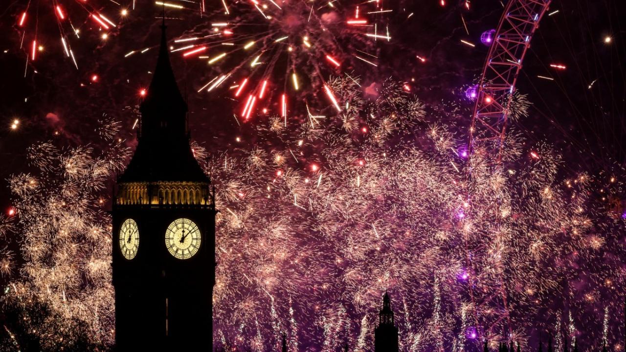Fireworks in the sky around the London Eye and The Elizabeth Tower at the Palace of Westminster, home to the Houses of Parliament, in central London, just after midnight on January 1, 2025 (Pic: AFP)