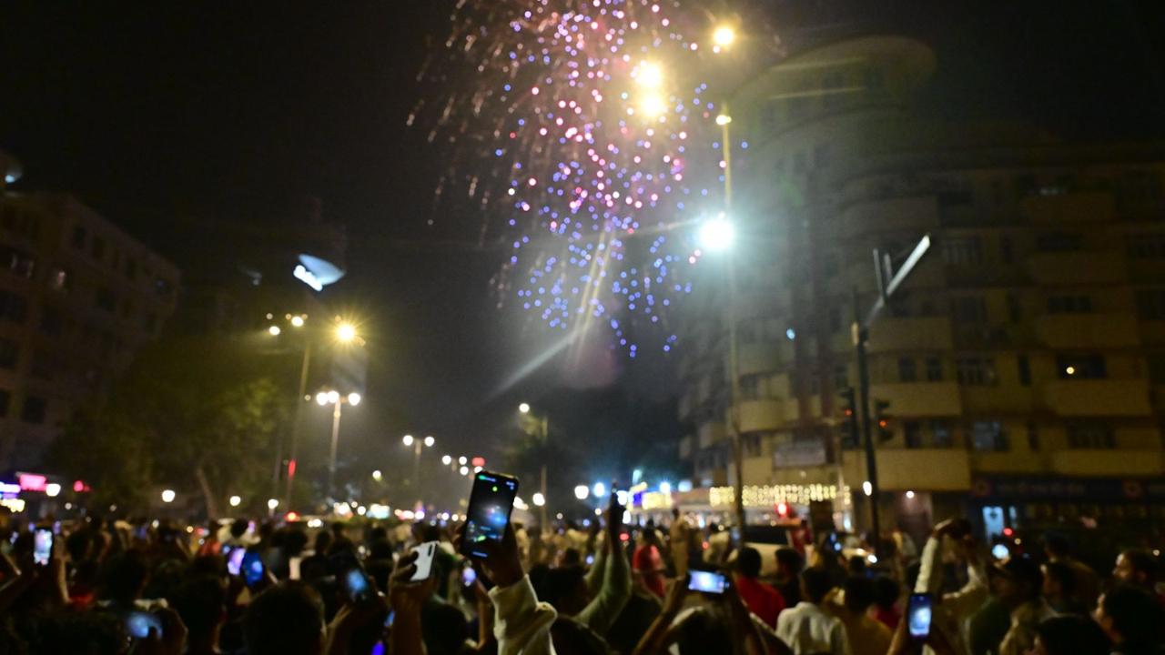 People welcome the New Year at Marine Drive in Mumbai on January 1, 2025 (Pic: Shadab Khan)