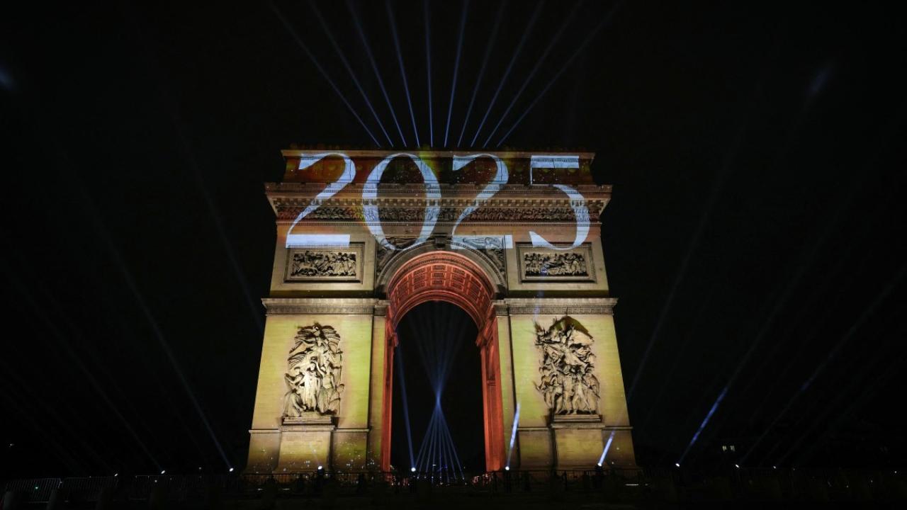 Illuminated Arc de Triomphe on the Avenue des Champs-Elysees in Paris early January 1, 2025, during New Year celebrations (Pic: AFP)