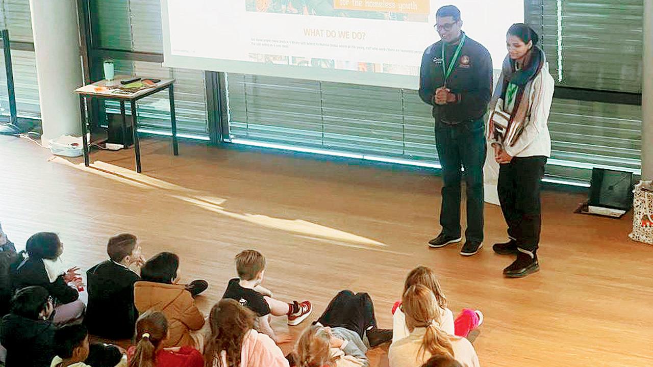 Amin Sheikh (in black) interacts with students in Rome
