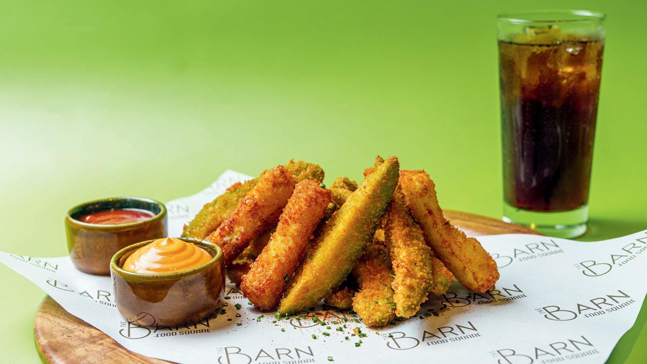 A plate of avacado and halloumi fries 