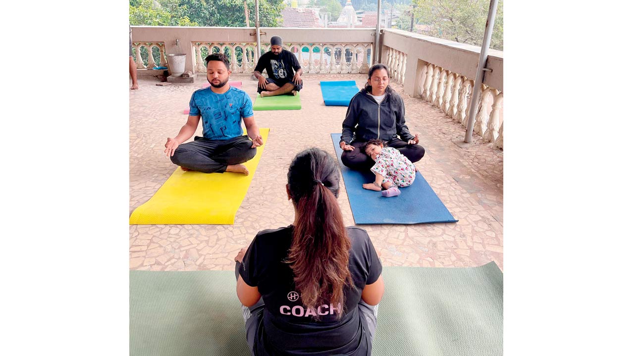 A moment from a  yoga session from the group’s first visit to the village in Palghar