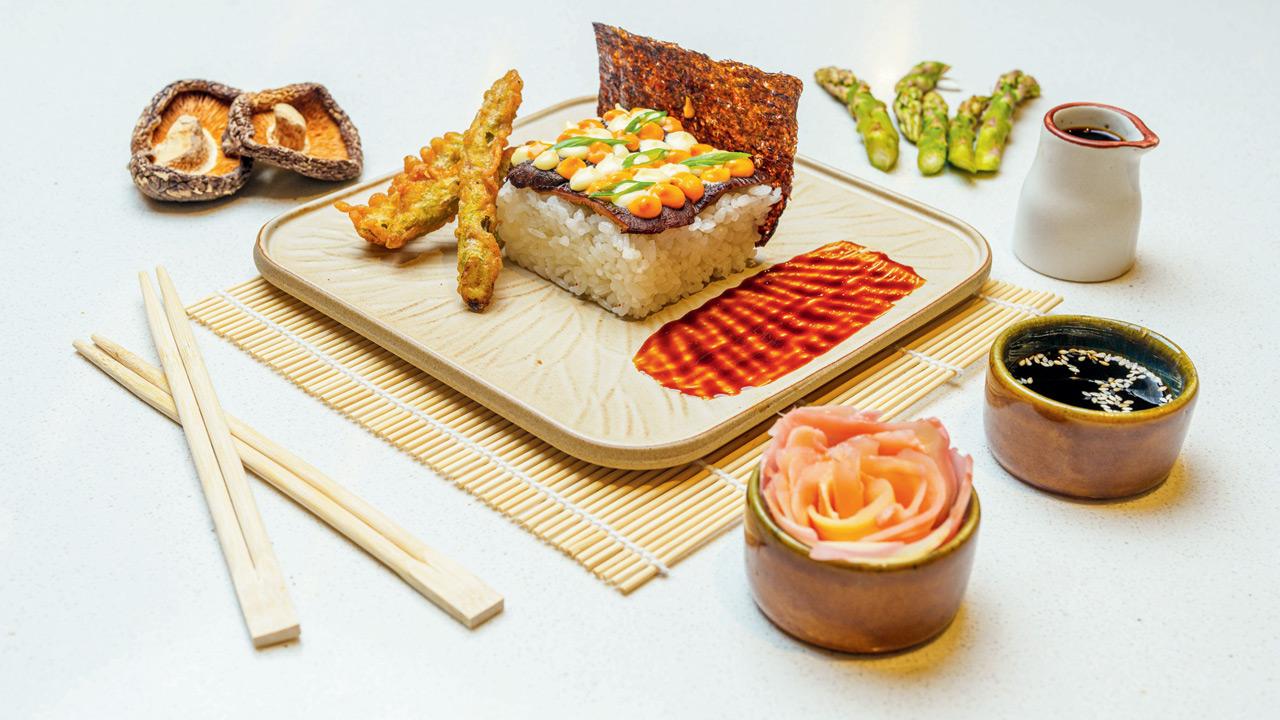 The sushi cake is flavoured with spicy mayo and togarashi 