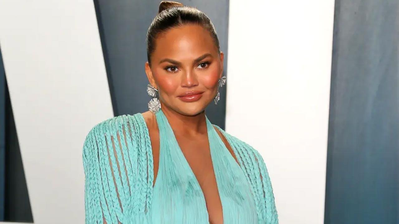 Chrissy Teigen evacuates home amid LA fires
