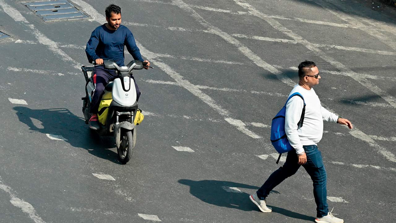 Delivery men on e-bikes in the Grant Road area. File Pics/Anurag Ahire