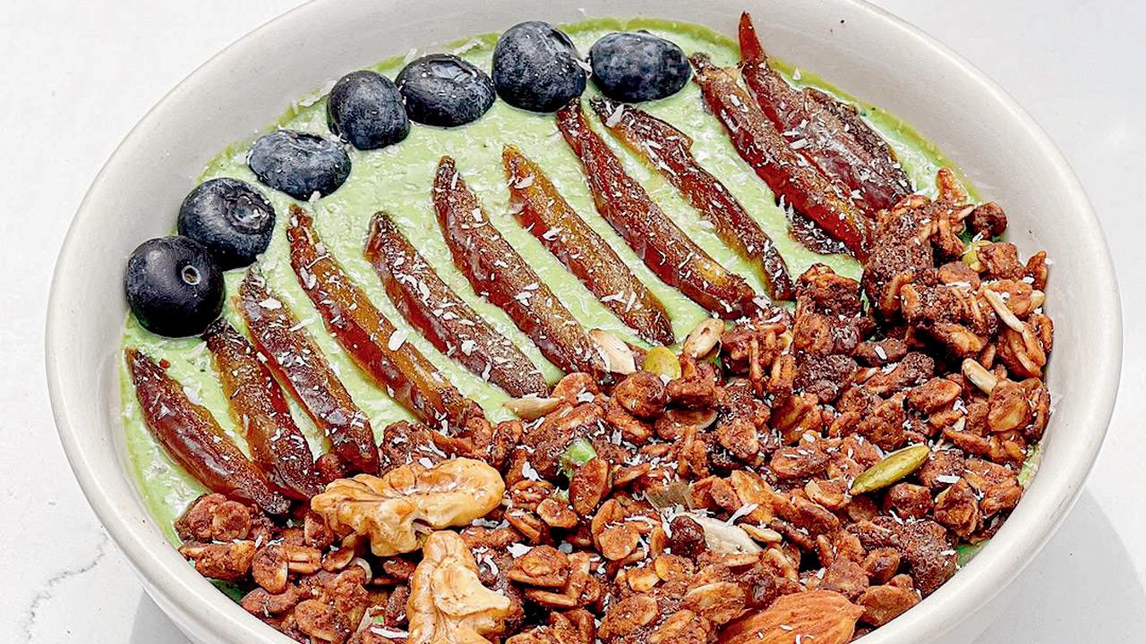 ↑ A creamy avocado bowl topped with crunchy in-house granola