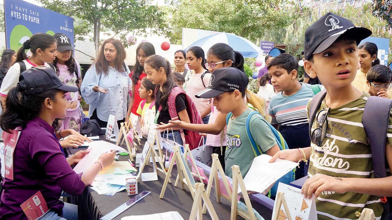 Children line up a stall at the event