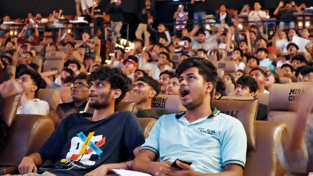Fans watch the action unfold
