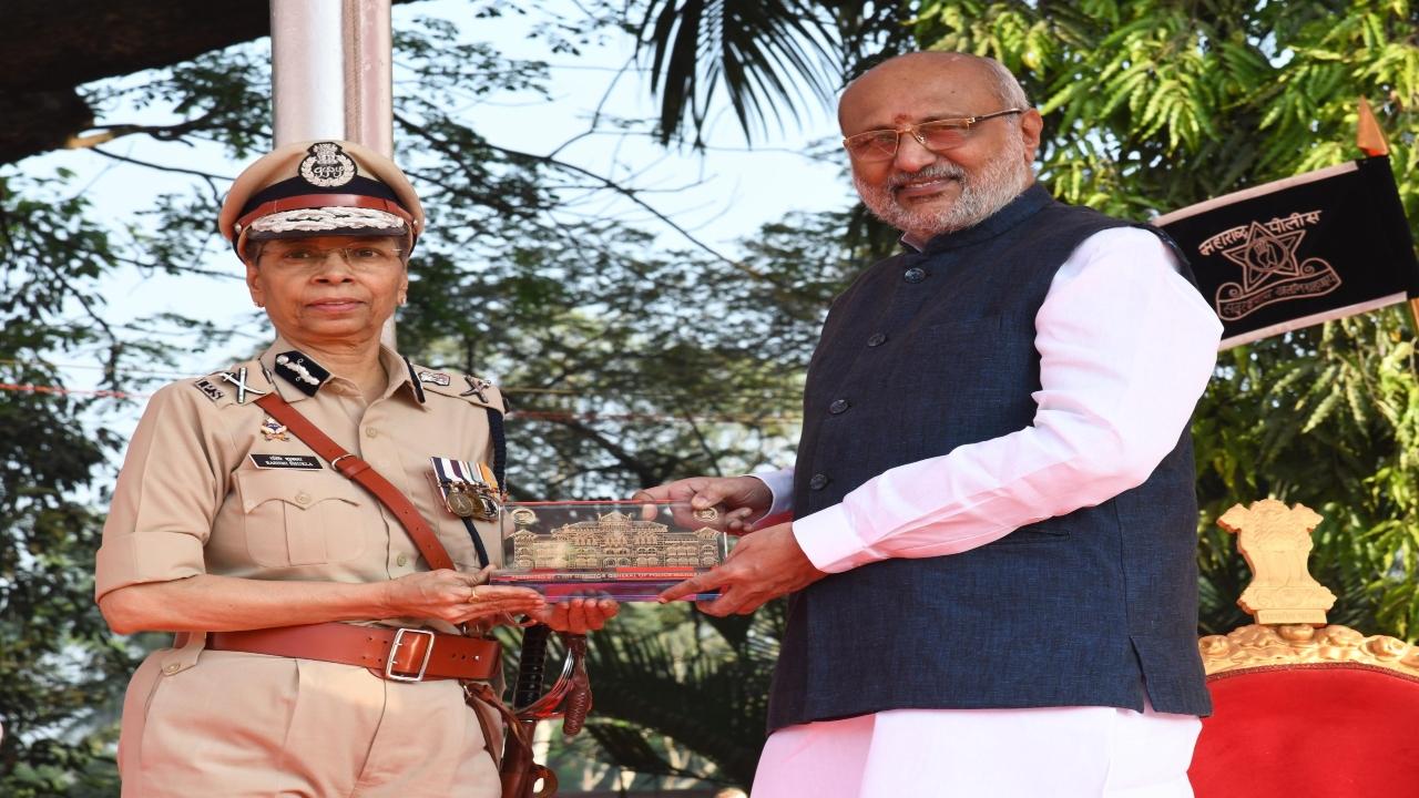 Governor Radhakrishnan with Director General of Police Rashmi Shukla at the function