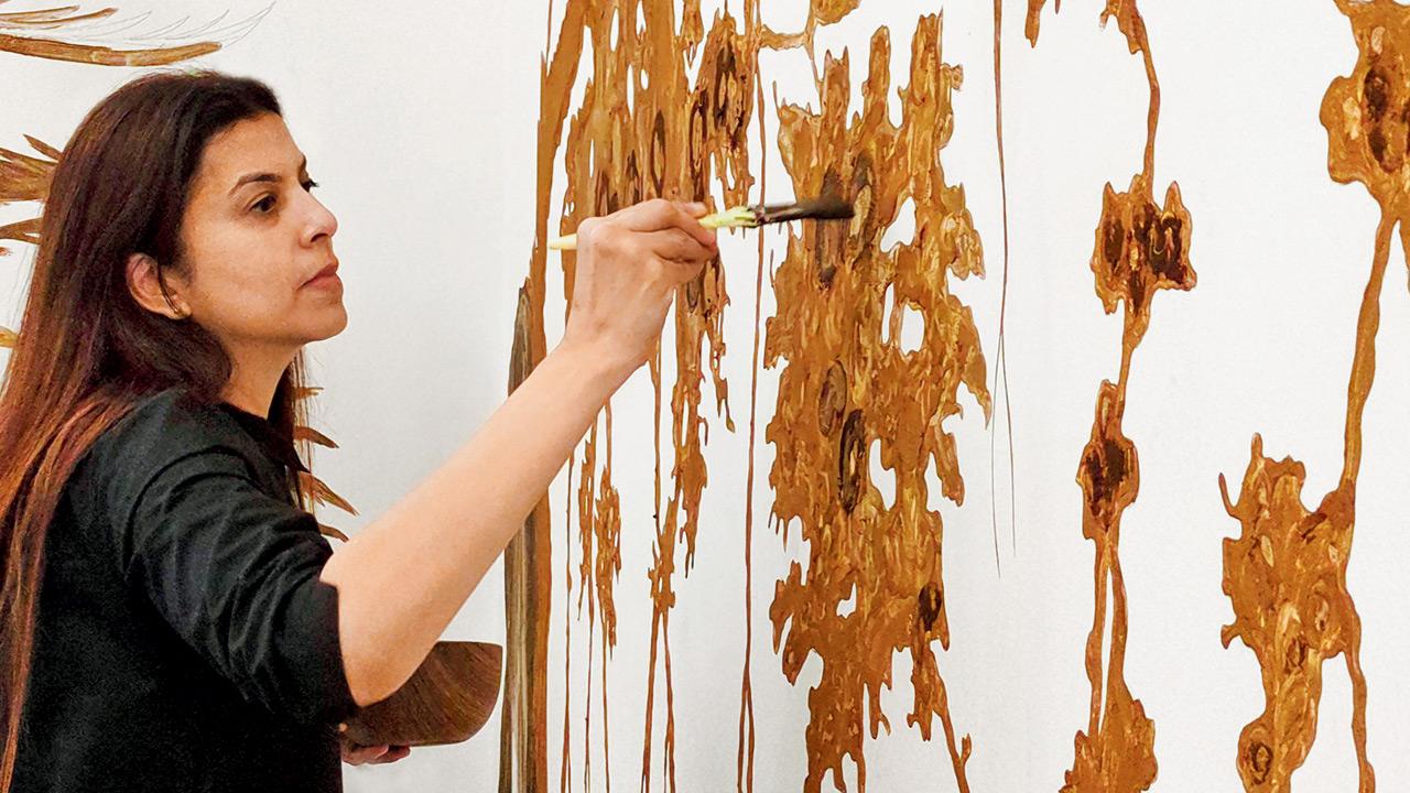 Saini Kallat works on the installation piece, 2 Degrees