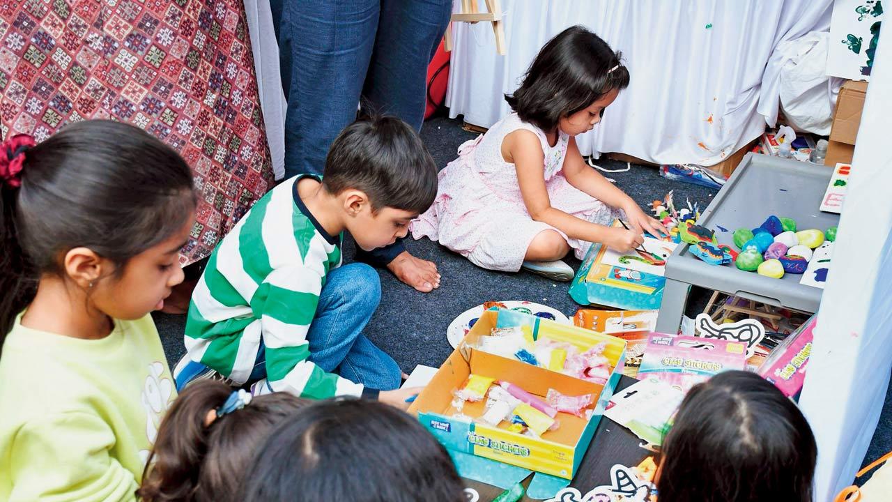 Children engage in craft-based activities at a previous edition