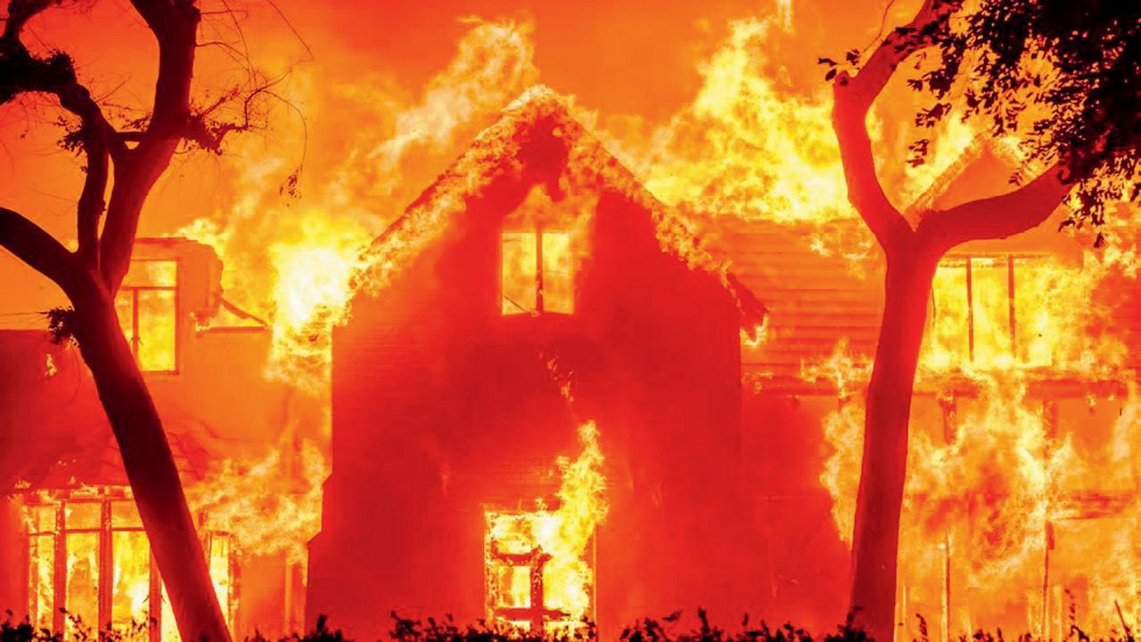 Los Angeles wildfires burn thousands of homes