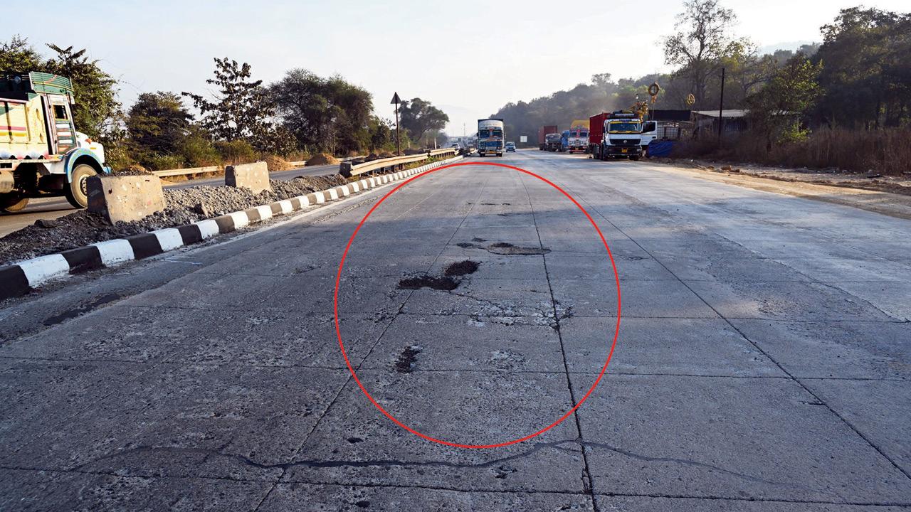 Fresh cracks appear on the newly white-topped highway stretch