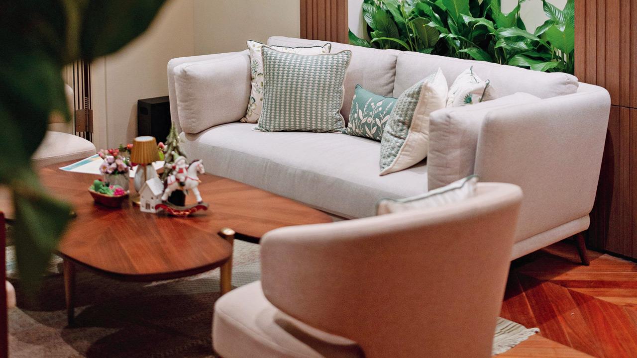 Arts Cafe exudes warmth and elegance, combining earthy tones of beige, brown, and pastels with Art Deco details, brass accents, and soft, luxurious lighting