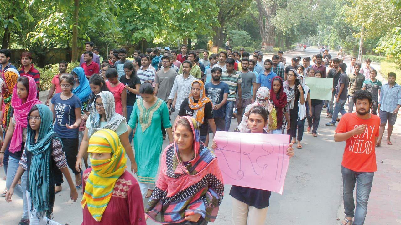 A key focus of the book is the use of digital technology, as exemplified in the 2017 BHU protests over the sexual assault of a female student. It gained national attention after students took to social media platforms to amplify their voices. Pic/Getty Images