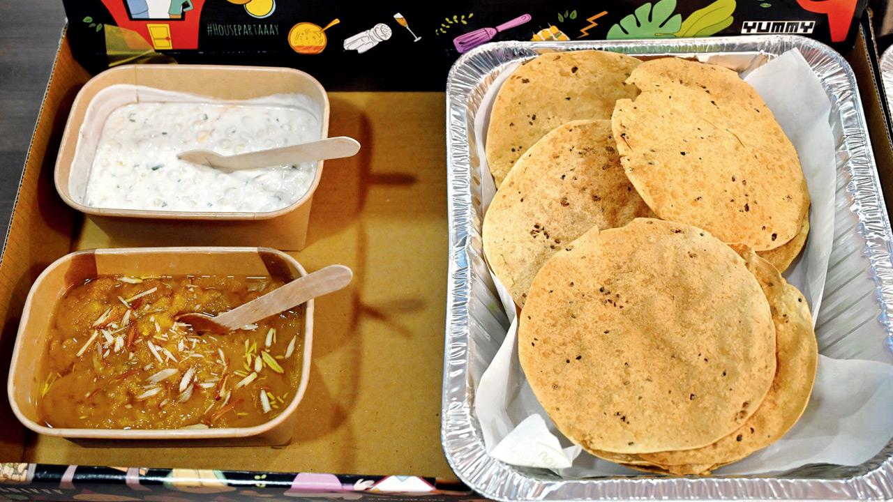 Moong dal halwa, boondi raita and papad