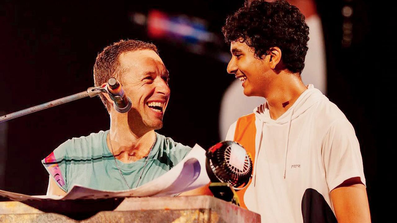Sharma with Chris Martin on stage