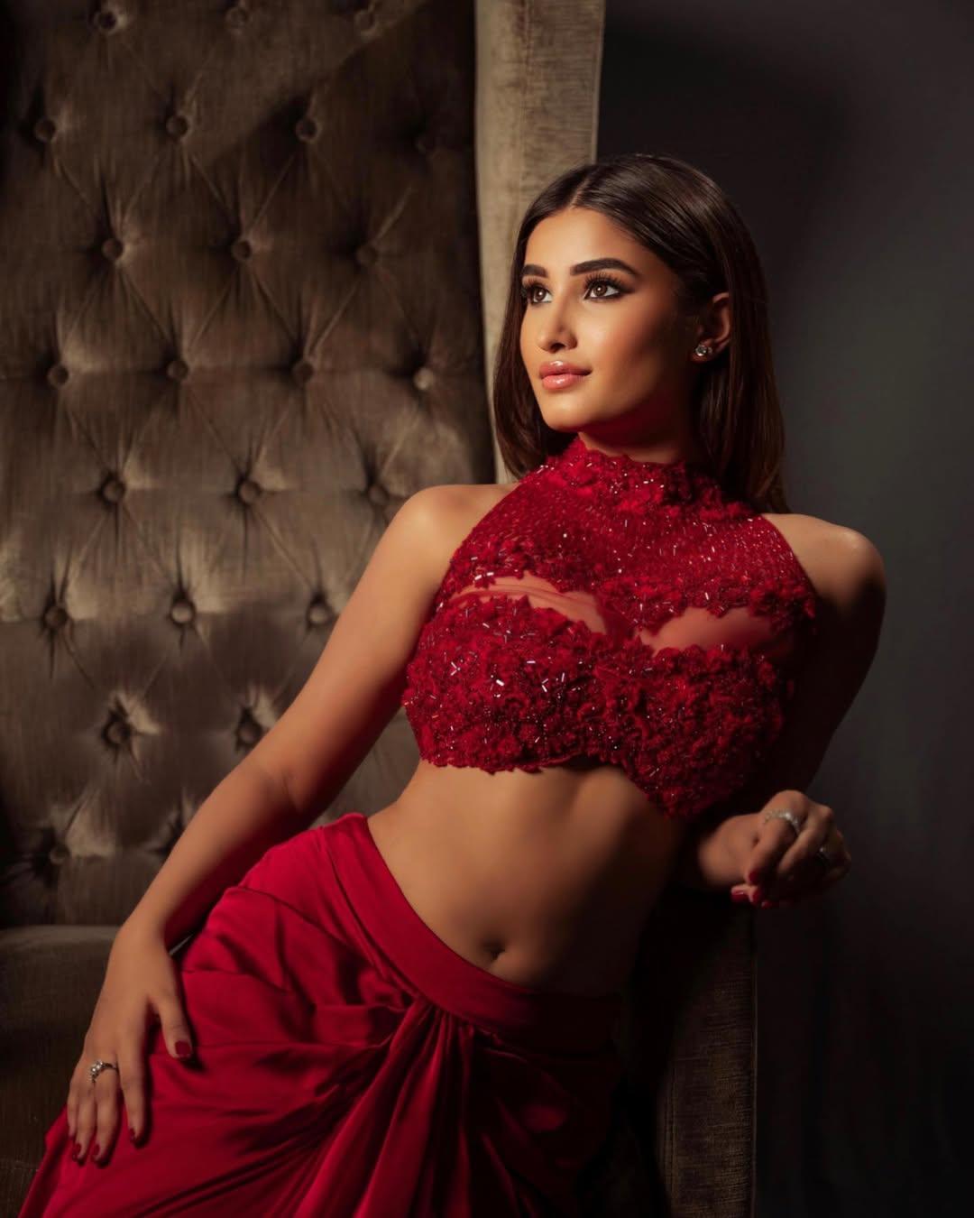 The actress stunned in a red embroidered top with a gathered skirt. She left her hair open and put on minimal makeup