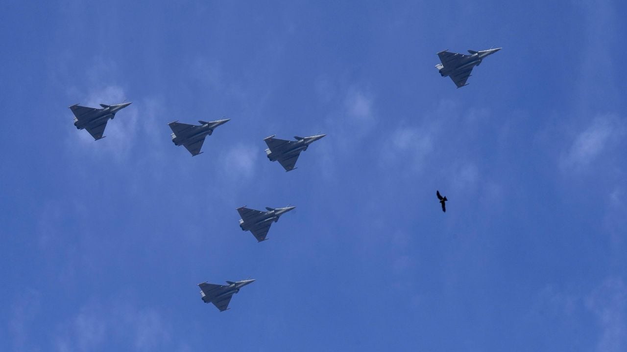 India Air Force's six Rafale aircrafts fly past in 'Marut' formation during a rehearsal for the Republic Day Parade 2025 in New Delhi